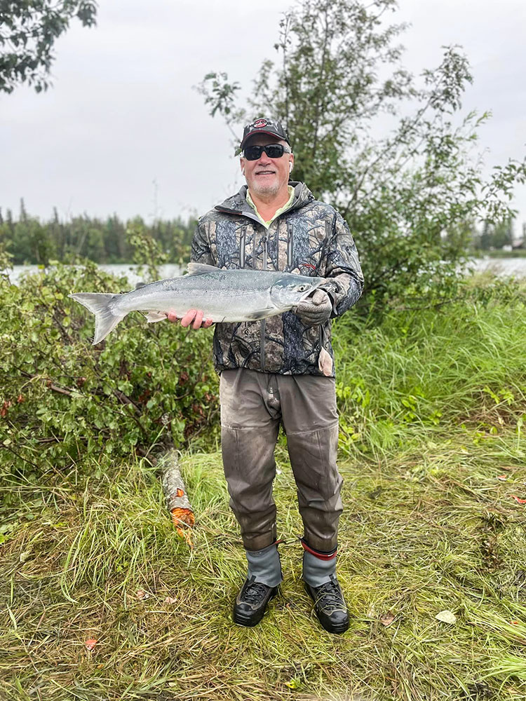 Man holding his salmon